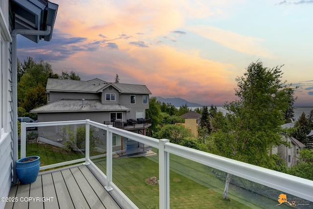 18706 Petrel Cir, Anchorage, AK 99516 - wooden deck featuring a lawn