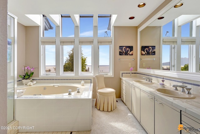 18706 Petrel Cir, Anchorage, AK 99516 - full bathroom featuring double vanity and a garden tub