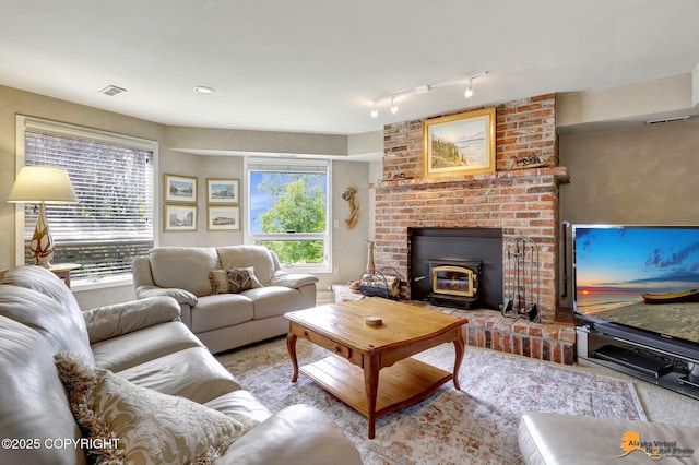 18706 Petrel Cir, Anchorage, AK 99516 - living area with a wood stove