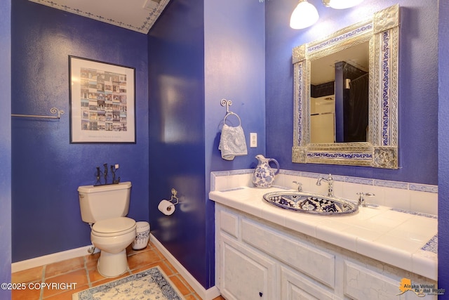 18706 Petrel Cir, Anchorage, AK 99516 - bathroom with toilet, vanity, tile patterned flooring, baseboards, and curtained shower