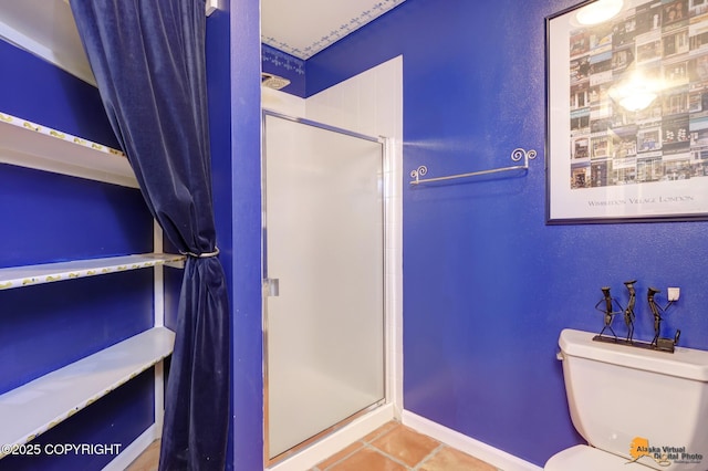 18706 Petrel Cir, Anchorage, AK 99516 - full bathroom with a stall shower, tile patterned floors, baseboards, and toilet