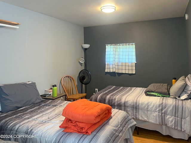 bedroom featuring hardwood / wood-style flooring