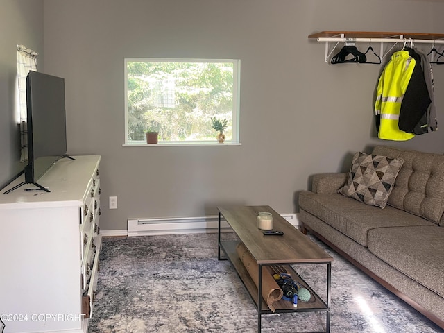 living room featuring a baseboard heating unit