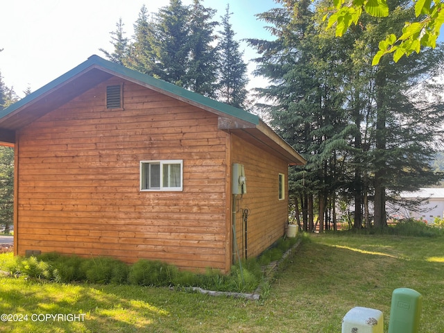 view of home's exterior featuring a lawn