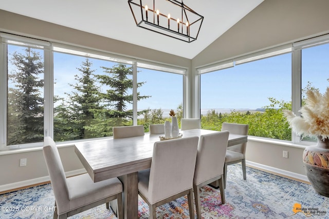 16268 Noble Point Dr, Anchorage, AK 99516 - sunroom featuring vaulted ceiling, healthy amount of natural light, a chandelier, and wood finished floors
