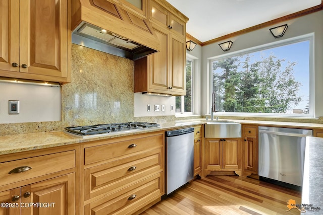 16268 Noble Point Dr, Anchorage, AK 99516 - kitchen featuring appliances with stainless steel finishes, custom exhaust hood, crown molding, backsplash, and light wood-style floors