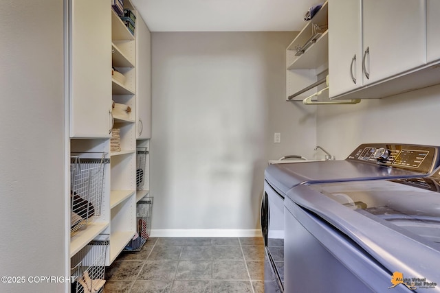 16268 Noble Point Dr, Anchorage, AK 99516 - laundry area with washer and clothes dryer and cabinet space