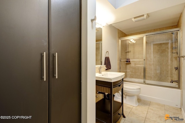 16268 Noble Point Dr, Anchorage, AK 99516 - bathroom featuring tile patterned flooring, vanity, and combined bath / shower with glass door