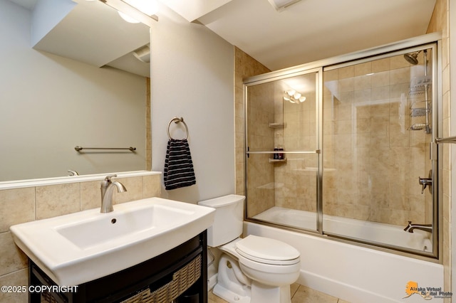 16268 Noble Point Dr, Anchorage, AK 99516 - bathroom featuring vanity and combined bath / shower with glass door