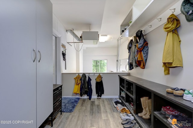 16268 Noble Point Dr, Anchorage, AK 99516 - mudroom featuring wood finished floors