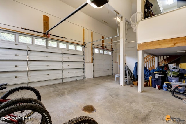 16268 Noble Point Dr, Anchorage, AK 99516 - garage featuring a garage door opener