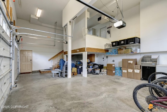 16268 Noble Point Dr, Anchorage, AK 99516 - garage featuring a garage door opener