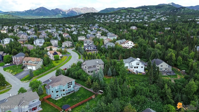 16268 Noble Point Dr, Anchorage, AK 99516 - aerial view of property and surrounding area with mountains and nearby suburban area