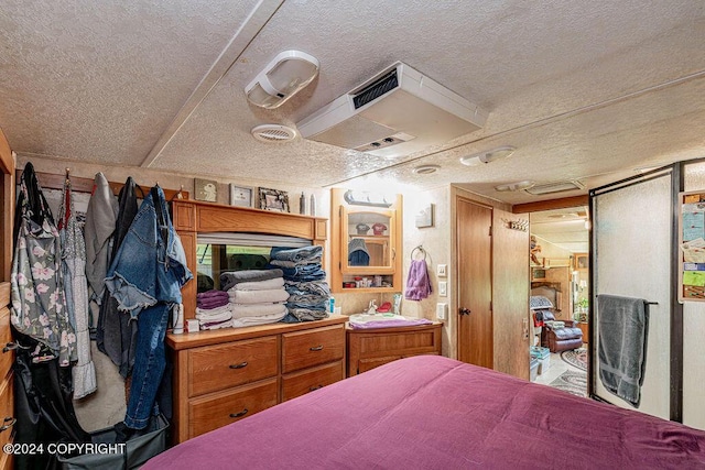 bedroom with a textured ceiling