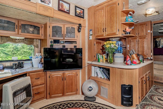 kitchen featuring heating unit