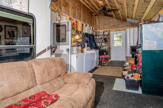 interior space with ceiling fan, wooden ceiling, vaulted ceiling, and washer / dryer