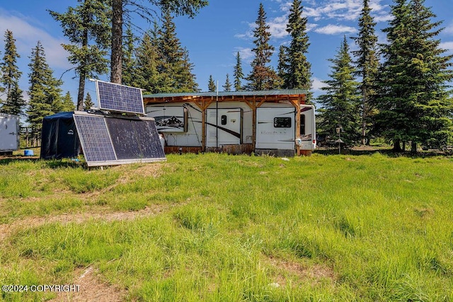 back of property with solar panels