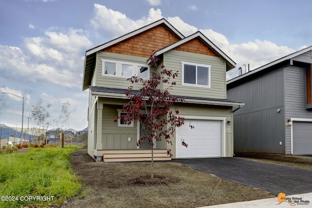 view of front of home with a garage