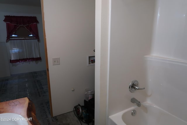 bathroom with shower / bathing tub combination