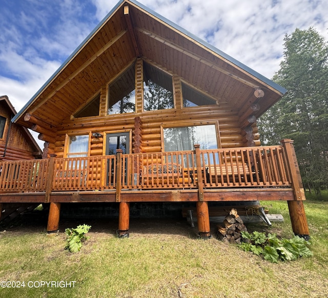 34335 Keystone Dr, Soldotna, AK 99669 - rear view of property with log siding and a deck