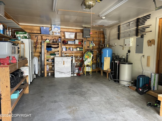 34335 Keystone Dr, Soldotna, AK 99669 - garage with electric panel and a garage door opener