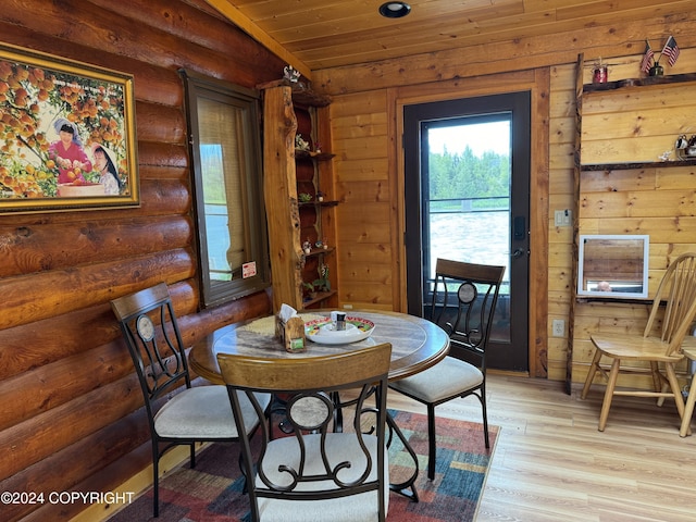 34335 Keystone Dr, Soldotna, AK 99669 - dining space with light wood-type flooring and wood ceiling