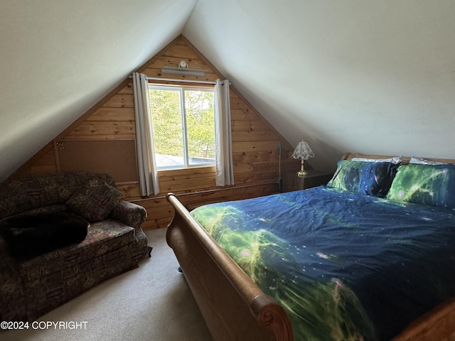 34335 Keystone Dr, Soldotna, AK 99669 - bedroom with wooden walls, vaulted ceiling, and carpet