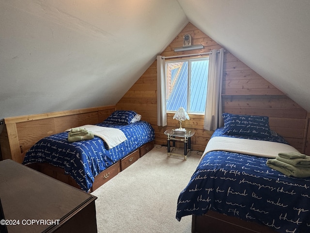 34335 Keystone Dr, Soldotna, AK 99669 - carpeted bedroom with wooden walls and vaulted ceiling