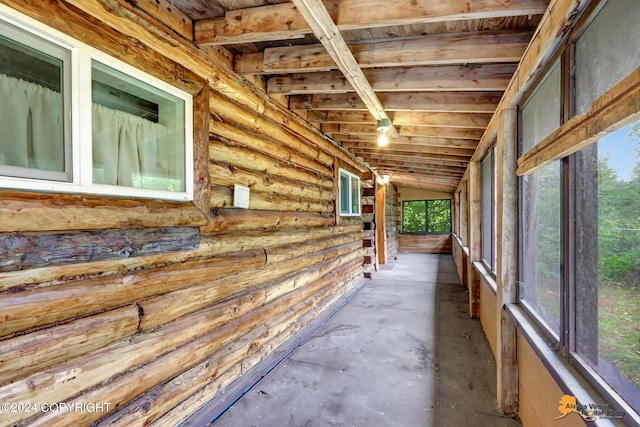 interior space featuring wood ceiling and lofted ceiling