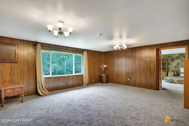 interior space with wood walls and a notable chandelier