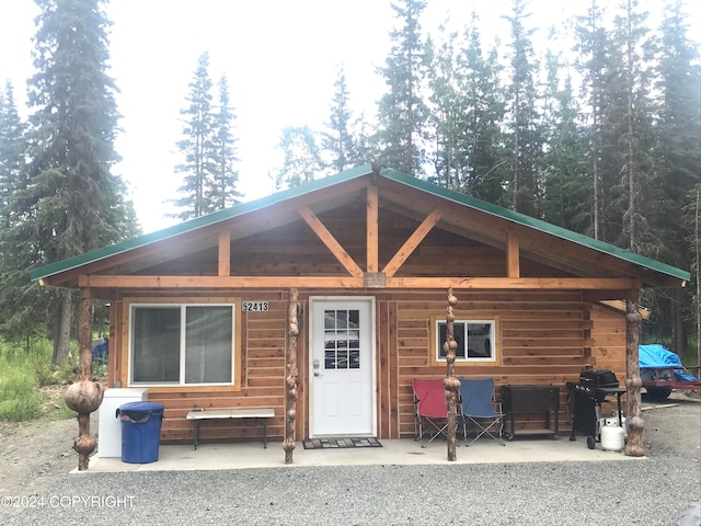 view of log-style house