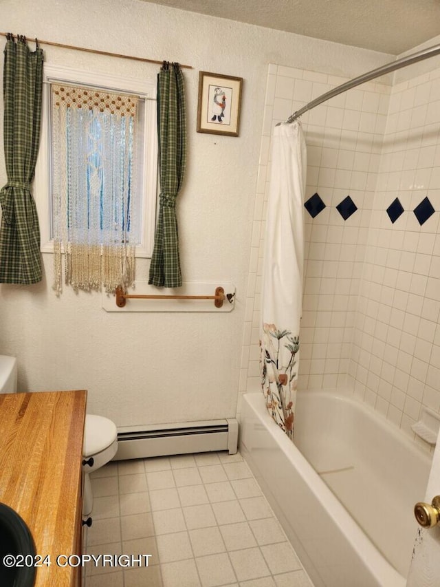 full bathroom with vanity, baseboard heating, toilet, and shower / bath combo