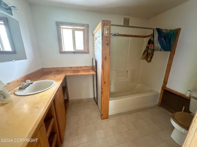 full bathroom with vanity, shower / washtub combination, and toilet