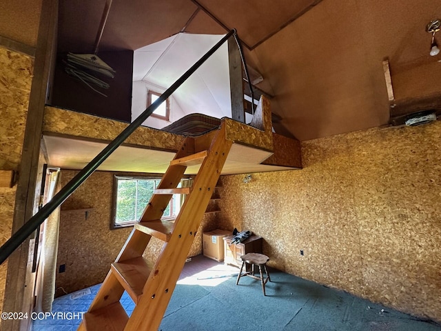 interior space featuring lofted ceiling