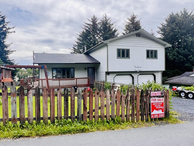 view of front of home featuring a garage