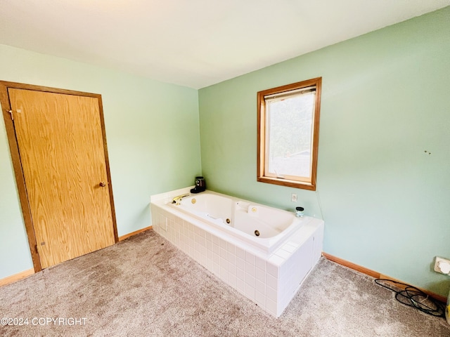 bathroom with tiled bath