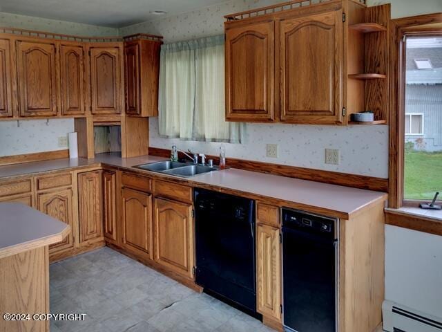 kitchen with a healthy amount of sunlight, sink, a baseboard radiator, and dishwasher