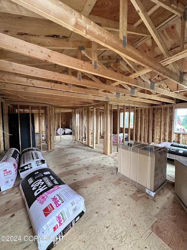 misc room featuring lofted ceiling