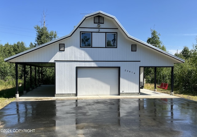 view of side of property featuring an outdoor structure