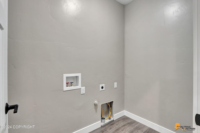 laundry room featuring wood-type flooring, gas dryer hookup, hookup for a washing machine, and electric dryer hookup