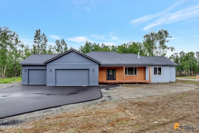 single story home with a garage