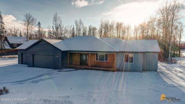 single story home featuring a garage