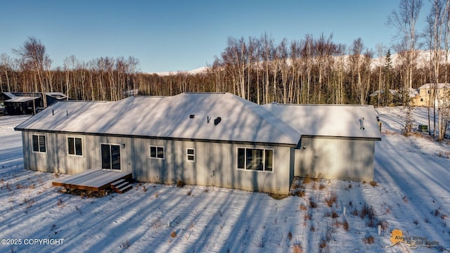 view of snow covered house