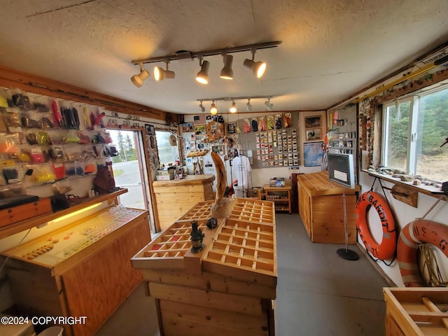 game room featuring track lighting