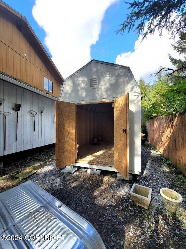 exterior space with a storage shed