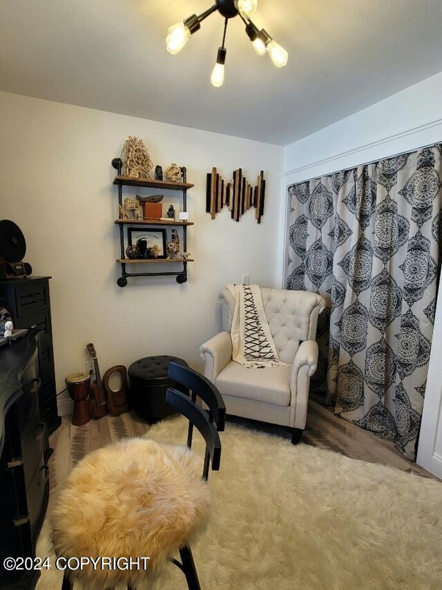 sitting room featuring hardwood / wood-style flooring