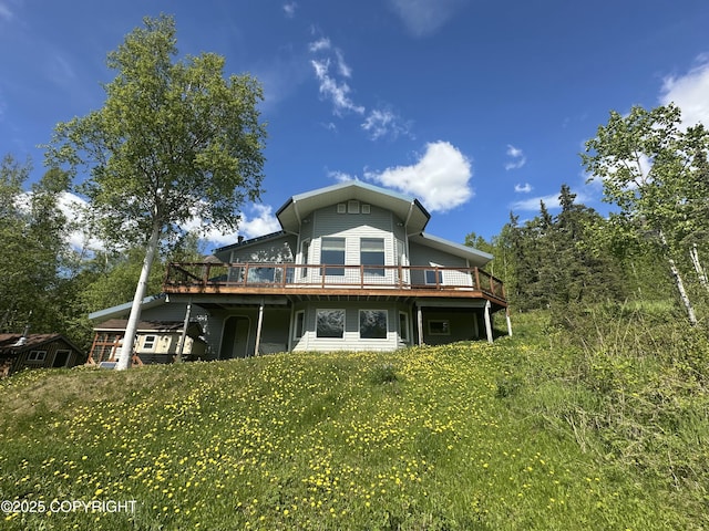 4477 Panther Dr, Eagle River, AK 99577 - back of house with a deck