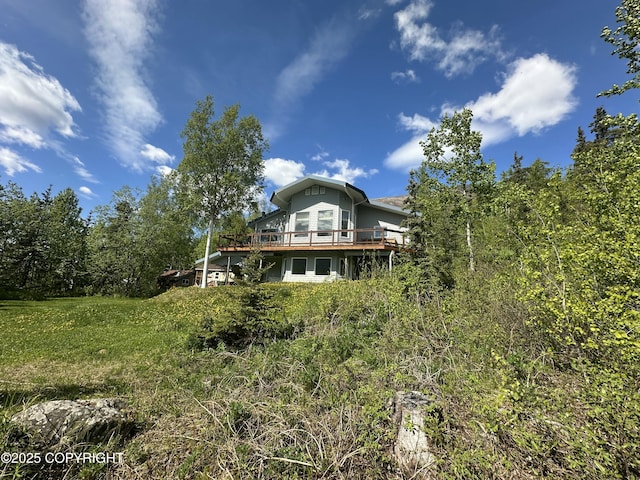 4477 Panther Dr, Eagle River, AK 99577 - back of property featuring a deck