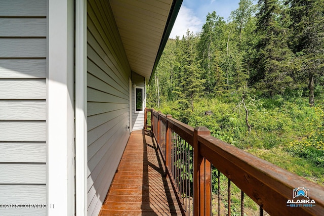 4477 Panther Dr, Eagle River, AK 99577 - balcony featuring a wooded view