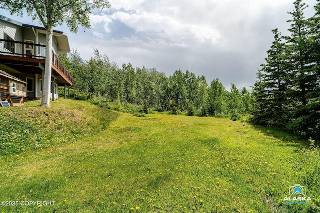 4477 Panther Dr, Eagle River, AK 99577 - view of yard with a deck